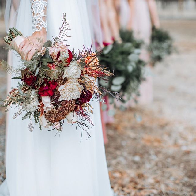 ruscus and dahlias adorn this wonderful bridal bouquet